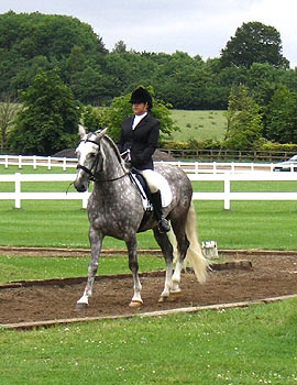 Moises and Nadia entering the arena