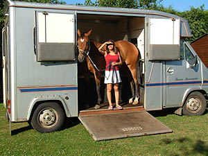 Nadia leading Jemma up into the lorry