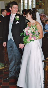 Helen and Ashley walking down the aisle