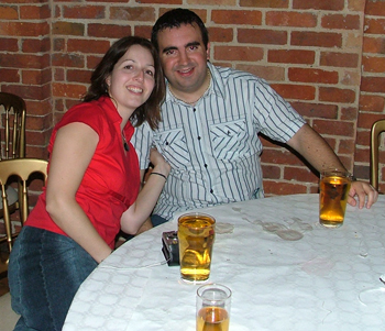 Kelly coping a feel of her better half Simon.